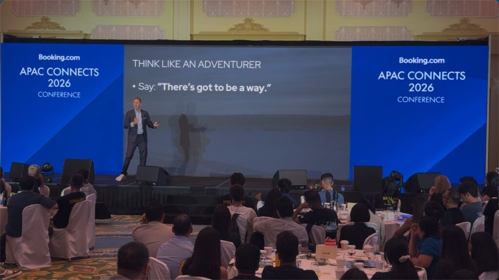 Rob Lilwall speaking at the Booking.com APAC Connects conference at Hong Kong Disneyland